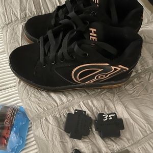 Youth boys heelys  size 4 worn 2 times